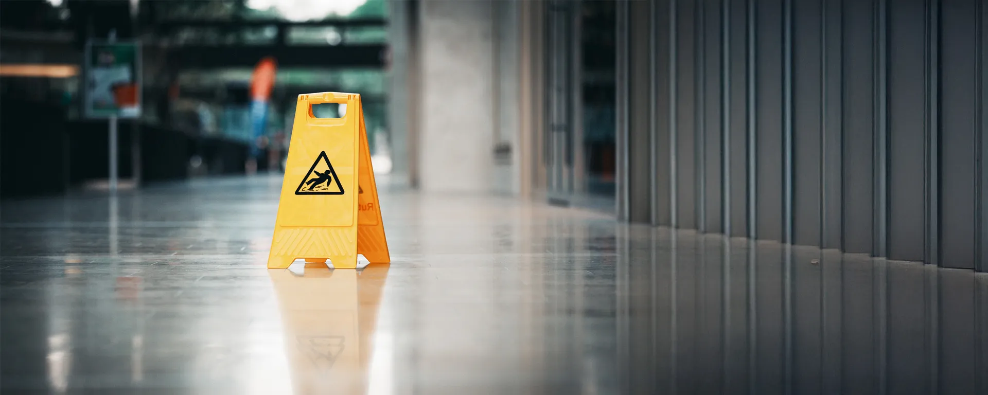 wet floor sign on street